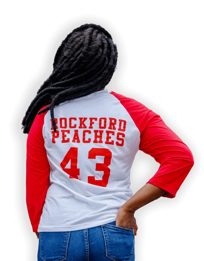 Woman in Rockford Peaches Jersey